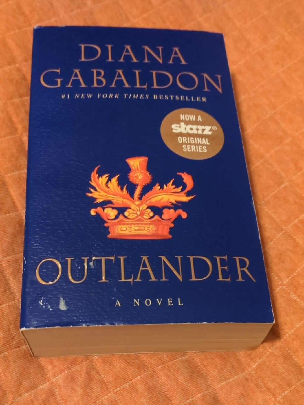 Outlander by Diana Gabaldon - Blue & Gold Paperback Novel